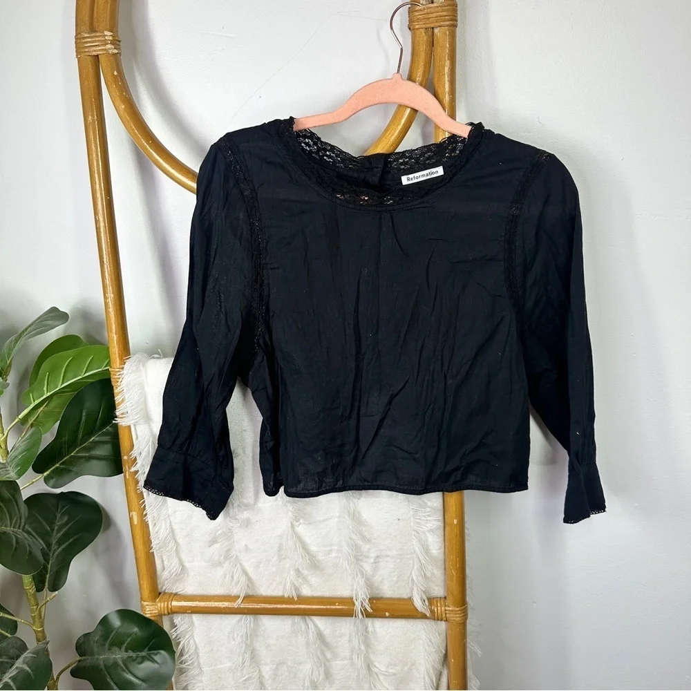 Reformation black sleeve